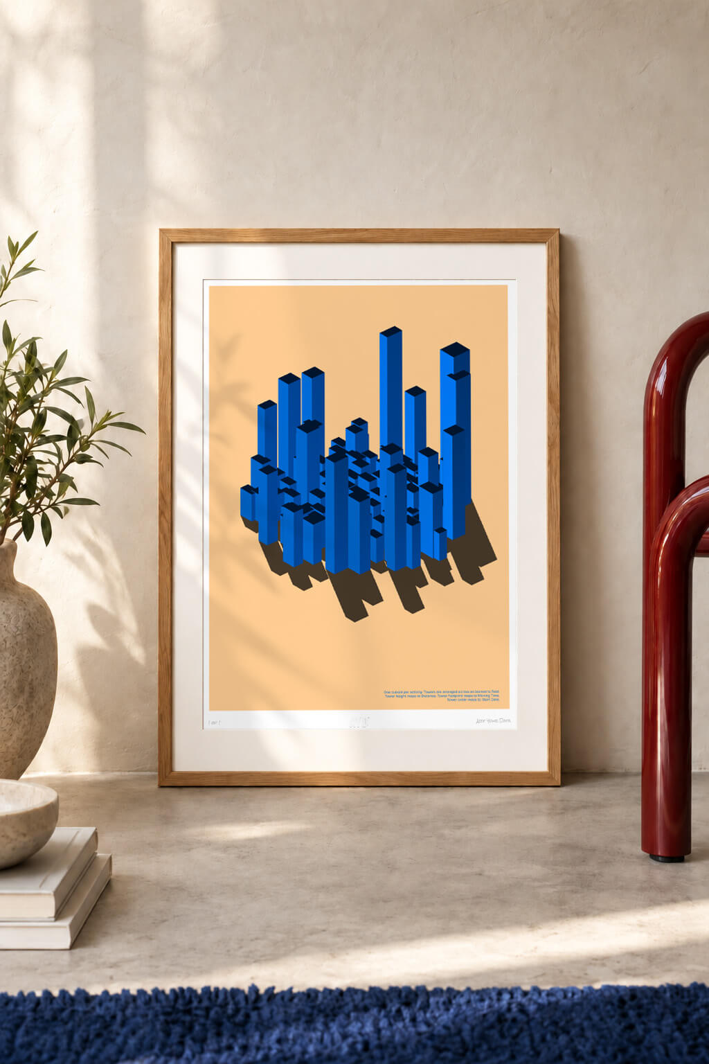 Blue 3D activity artwork framed in a light room