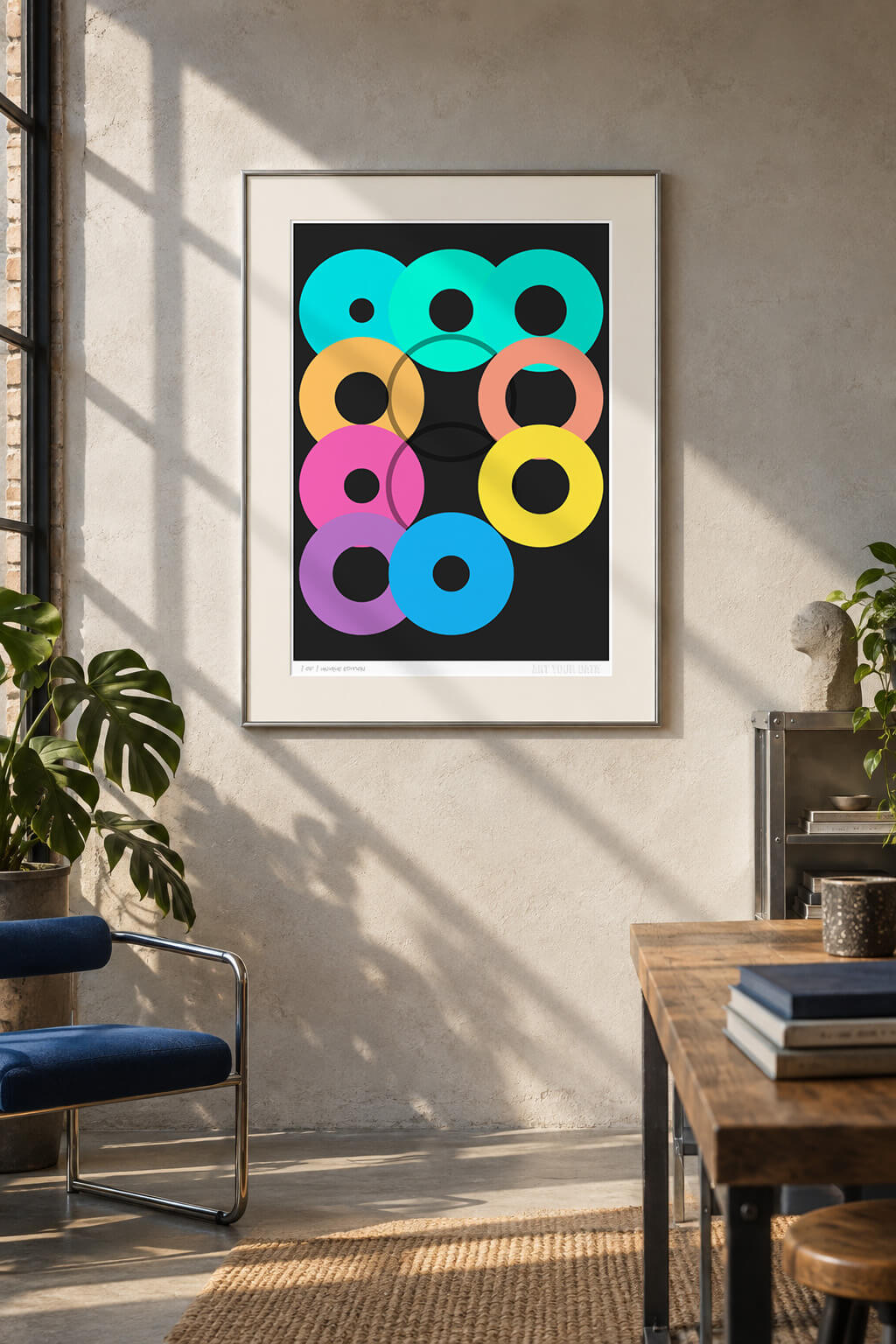 Colourful circles artwork framed in an office